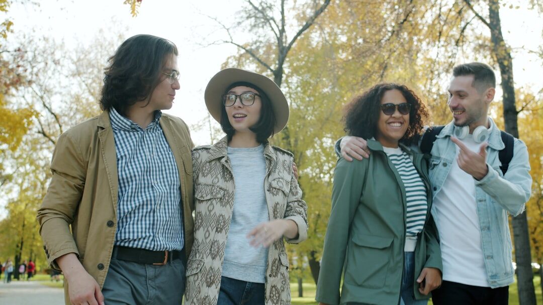friends talking in park