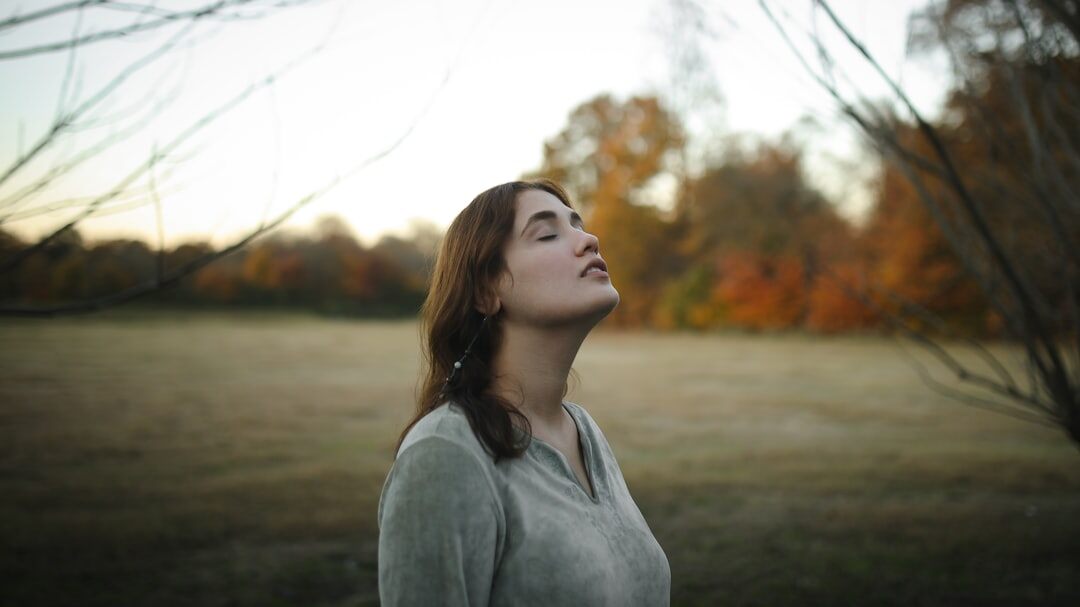 woman practicing breathing exercise