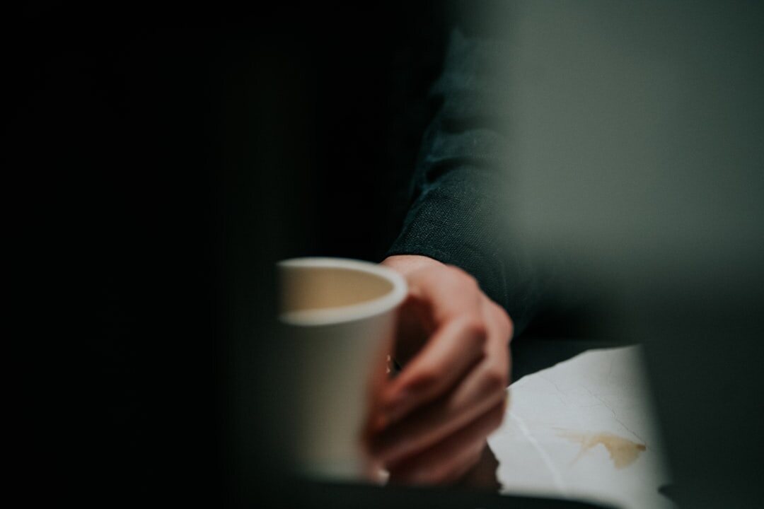 person journaling in morning light